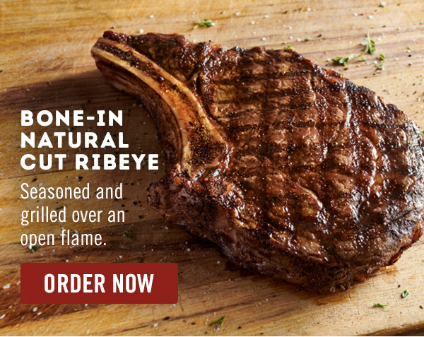 Bone-In Natural Cut Ribeye: Seasoned and grilled over an open flame.